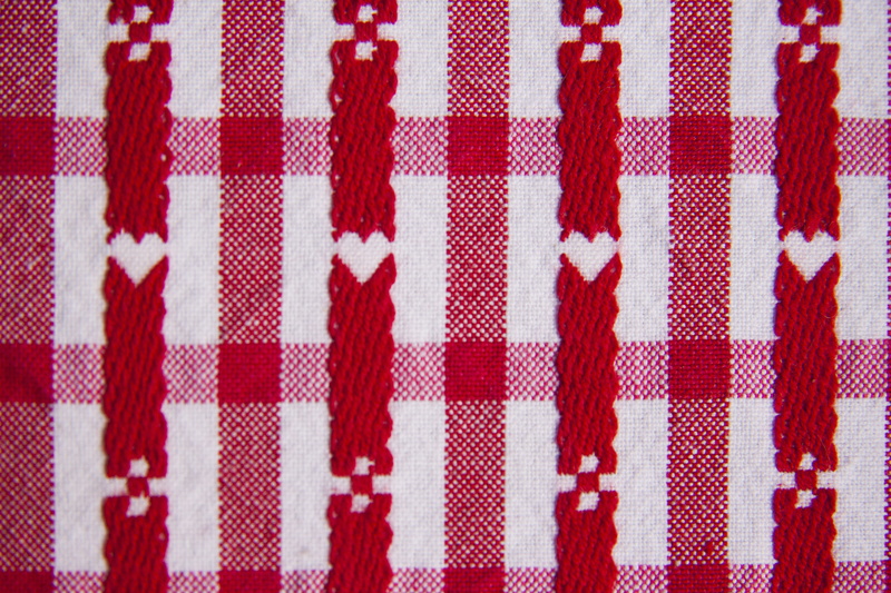 directly above, day, art and craft, repetition, woven, cotton, cover piece, fabric, heart, indoors, tissue, hospitality, cross, textile, red, textured
