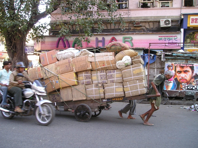 mumbai, cardboard, boxes, men, wagon, tow, street, land vehicle, incidental people, wooden, work, women, architecture, group of people, city, road, hard work