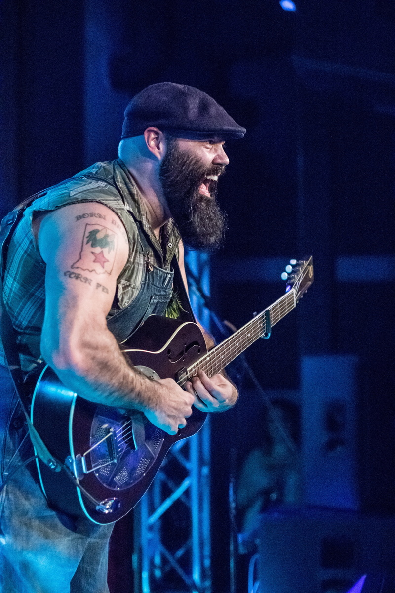 one person, face, plucking an instrument, musical instrument, tattooed, performance, playing, guitarist, night, nightlife, popular music concert, guitar