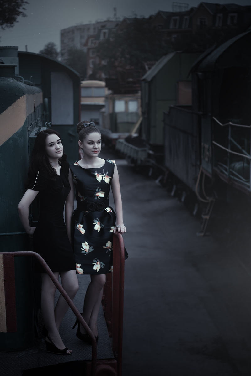 emotions, adult, architecture, style, standing, girls at the station, full length, train, model, young adult, pin up girl, fashion, youth, two people, dress