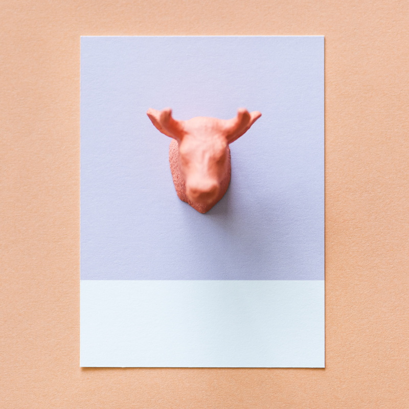 full length, shape, representation, table, no people, little, one animal, animal, toy, colored background, creative, indoors, 4K, orange, close-up, card