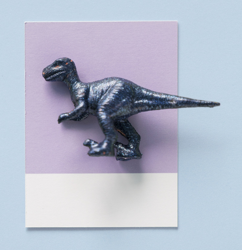 pattern, gray, dinosaur, fun, creativity, metallic, no people, full length, play, joy, paper, one animal, cute, decoration, creative, blue, abstract, colored background