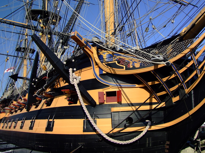 wood, boat, building exterior, architecture, pole, trafalgar, outdoors, low angle view, 2K, sunlight, clear sky, sailboat, no people, complexity, built structure