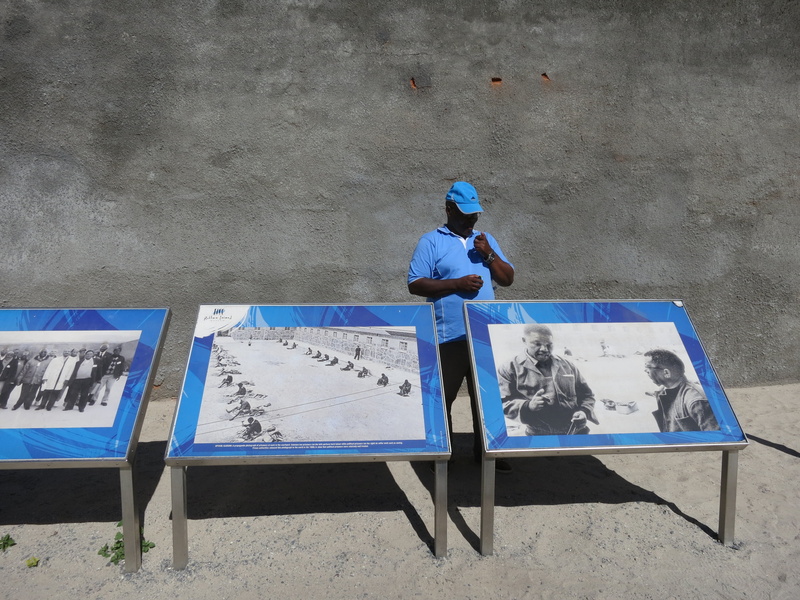 standing, skill, rear view, mandela, men, cape town, paint, outdoors, one person, south africa, high angle view, robben island, casual clothing, 4K, wall - building feature