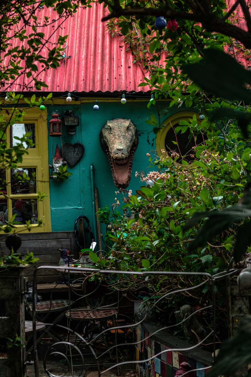 building exterior, united kingdom, window, gnome, england, day, bush, obsolete, island, junkyard, built structure, quirky, hippy, architecture, city, alternative