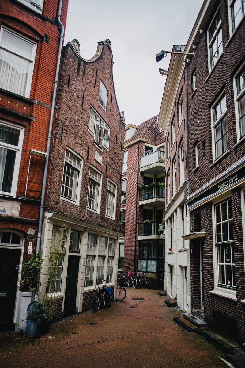 low angle view, home decor, row house, residential district, apartment, 5K, bike, building exterior, window, urban, quirky, no people, walkway, alley