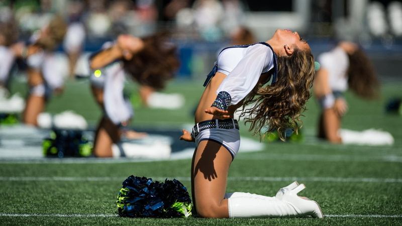 teenager, real people, athlete, s, competition, boots, 1080P, uniform, shorts, tights, lifestyles, focus on foreground, Seattle Seahawks, incidental people