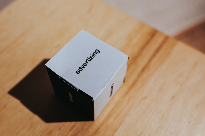photoshooting, cardboard, envelope, 4K, western script, studio shot, still life, anticipation, close-up, strategy, paper, box, text, focus on foreground