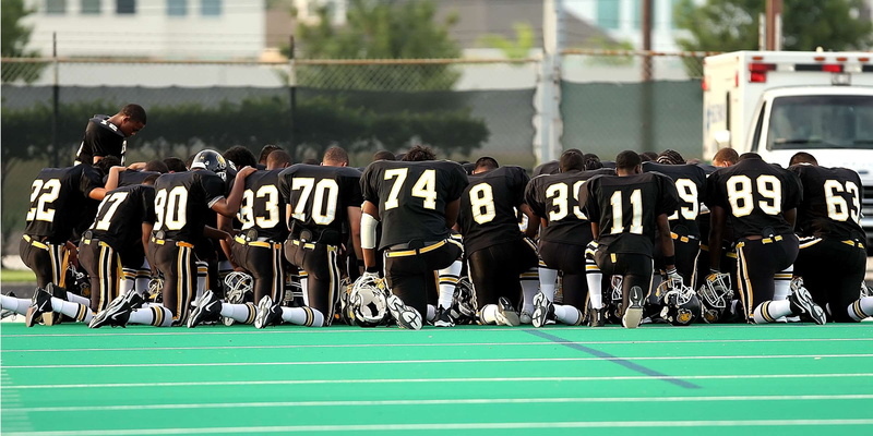 teammates, reverence, game, kneeling, lifestyles, football team, athlete, men, human, association, playing field, exercising, team, clothing, football
