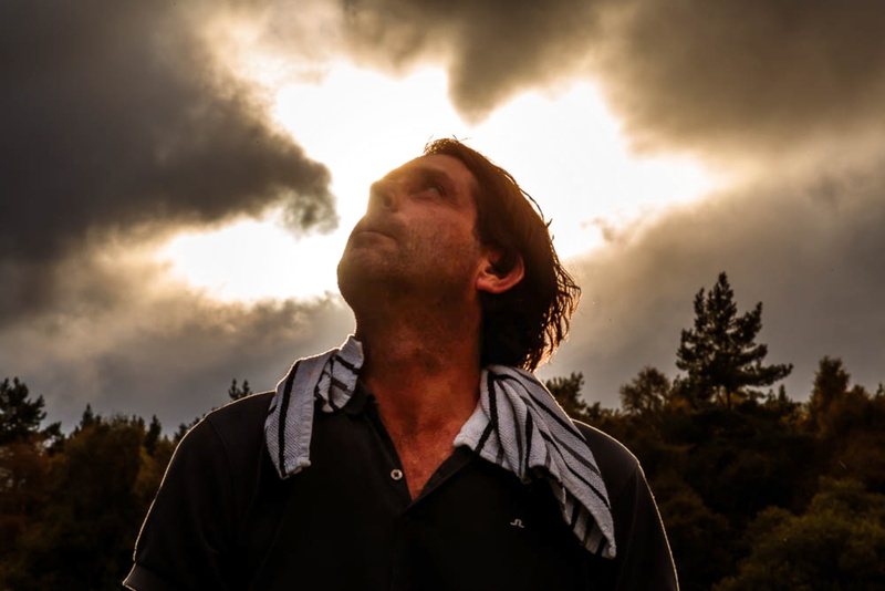 portrait, halo, clouds, front view, men, outdoors, cloud - sky, nature, adult, sunlight, headshot, beard, sky, one person, tree, 8K, almighty, young adult