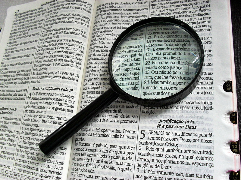 eyeglasses, searching, high angle view, no people, lens, black, education, indoors, paper, glasses, looking through an object, scrutiny, western script