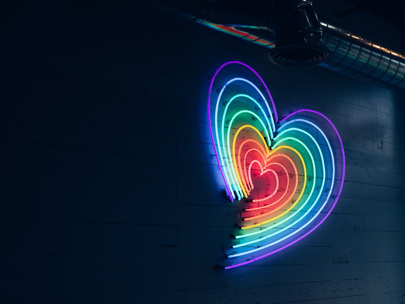 wall, indoors, illuminated, heart, long exposure, spinning, multicolored, copy space, arts culture and entertainment, dark, neon, motion, no people, black background