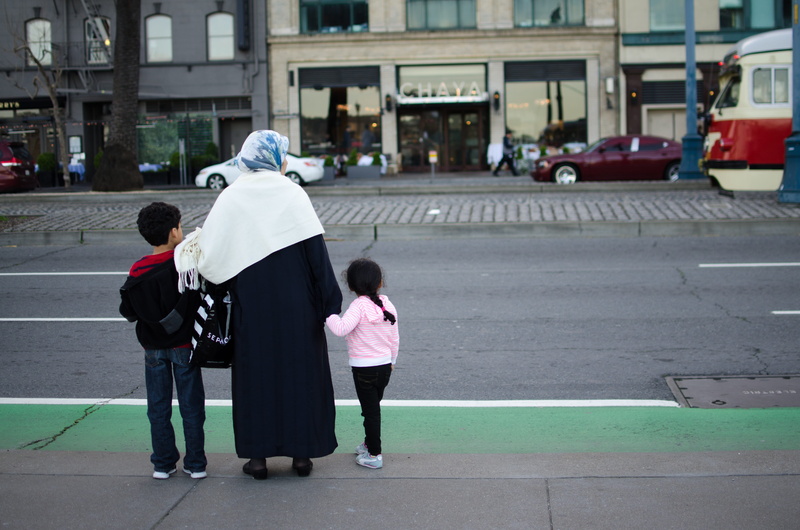 family, women, child, childhood, lifestyles, daughter, transportation, motherhood, architecture, migrants, building exterior, people, real people, street