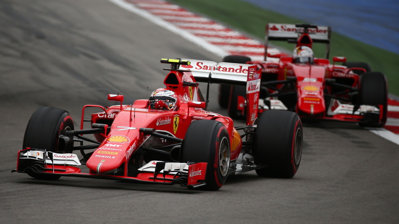 on the move, driving, outdoors, racecar, sports race, speed, sebastian vettel, people, kimi raikkonen, competition, day, occupation, motion, mode of transportation