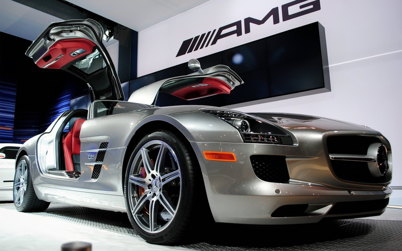 no people, land vehicle, auto racing, mode of transportation, motor vehicle, security, car, professional sport, transportation, red, wheel, gull-wing doors