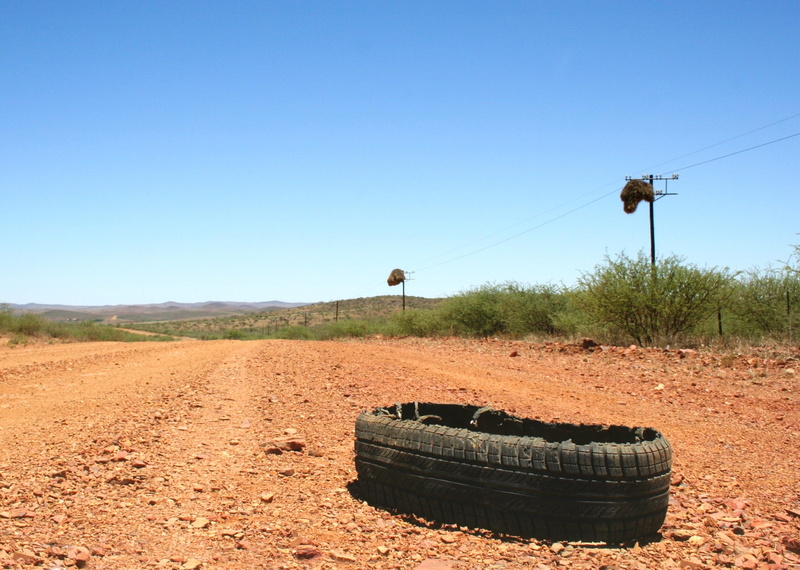south africa, rubber, safety, no people, power supply, nature, sunlight, tyre, copy space, car, sky, transport, maintenance, blowout, automobile, field