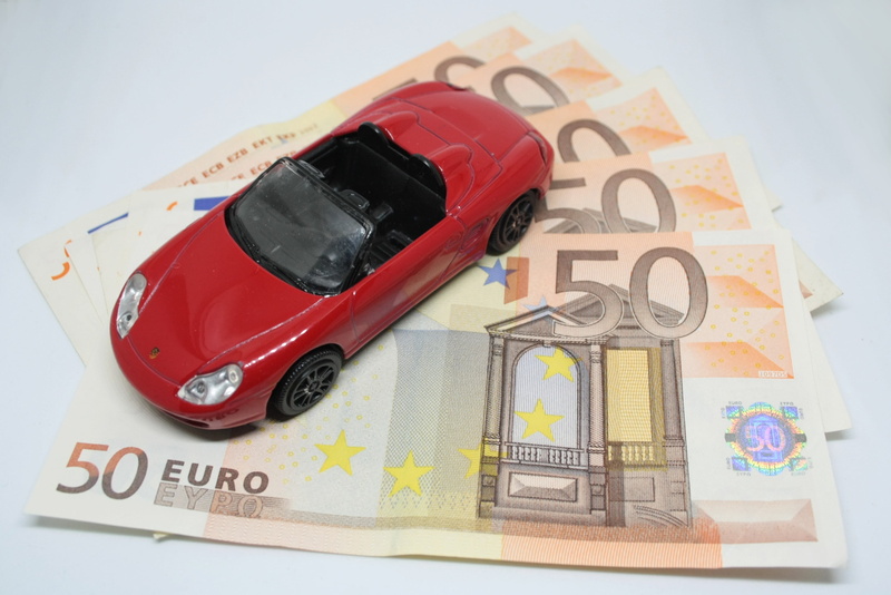 number, die, paper currency, finance, studio shot, toy car, money, games, car, red car, currency, economy, coin, indoors, ferrari, insurance, machine, toys