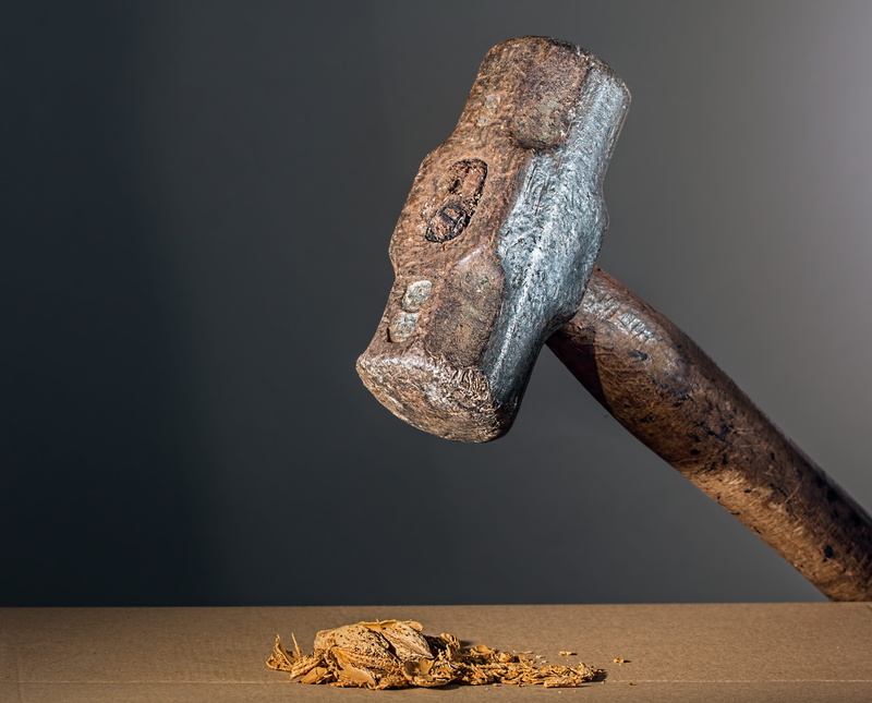 table, old, hit, metal, studio shot, hand tool, beating, threaten, mallet, steel, single object, dominate, breaking, fear, work tool, striking, intimidate