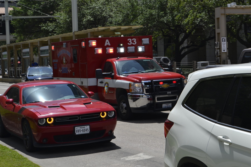 speeding, architecture, fast, alert, electric, system, safety, engine, wheel, grass, medic, life, roadway, transport, outdoors, traffic, houston, building exterior