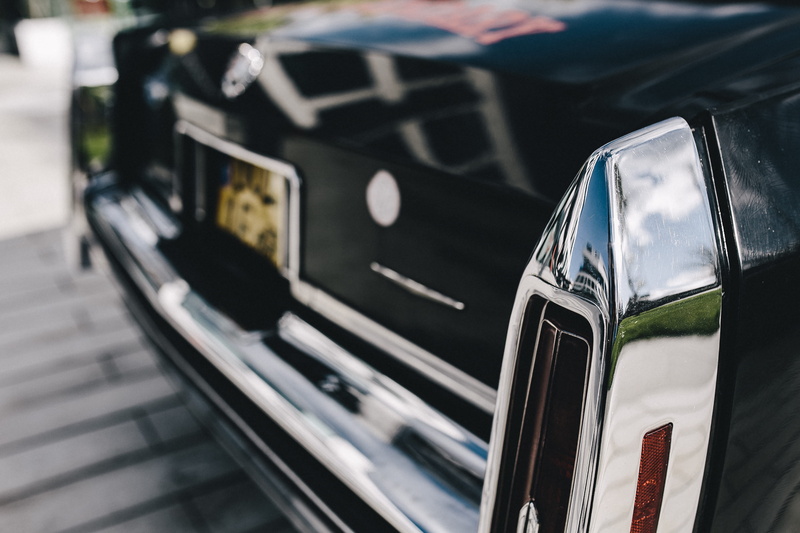 public transportation, luxury, outdoors, focus on foreground, retro, light, shiny, lifestyles, rear, travel, urban Scene, old-fashioned, transportation