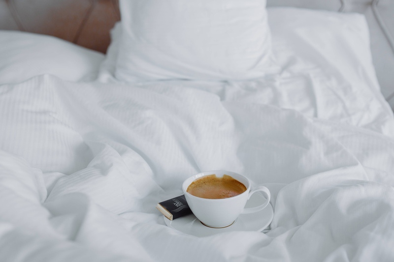 domestic room, Morning coffee, sheets, breakfast, bed, coffee cup, women, furniture, luxury, white color, tea cup, refreshment, chocolate, pillow, in bed