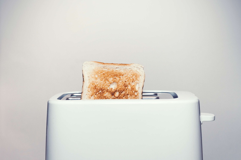 white background, food, copy space, wireless technology, gray background, toast, appliance, breakfast, indoors, meal, silver colored, toasted bread, bread