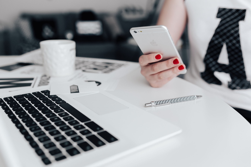 creativity, holding, modern, human hand, desk, wireless technology, woman, selective focus, workplace, female, workspace, human body part, phone, laptop