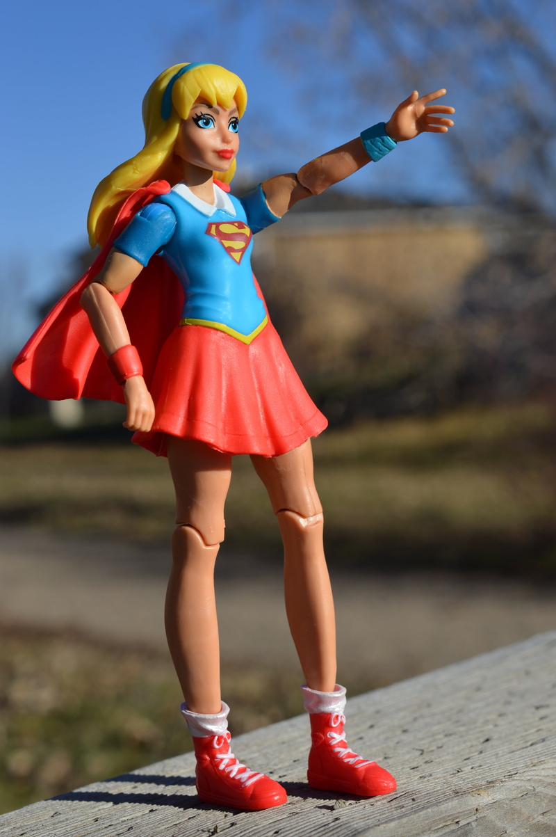 fashion, cape, toy, day, feminism, limb, super, red, strong, wooden, power, skirt, hero, action, leisure activity, young adult, dc, real people, human body part