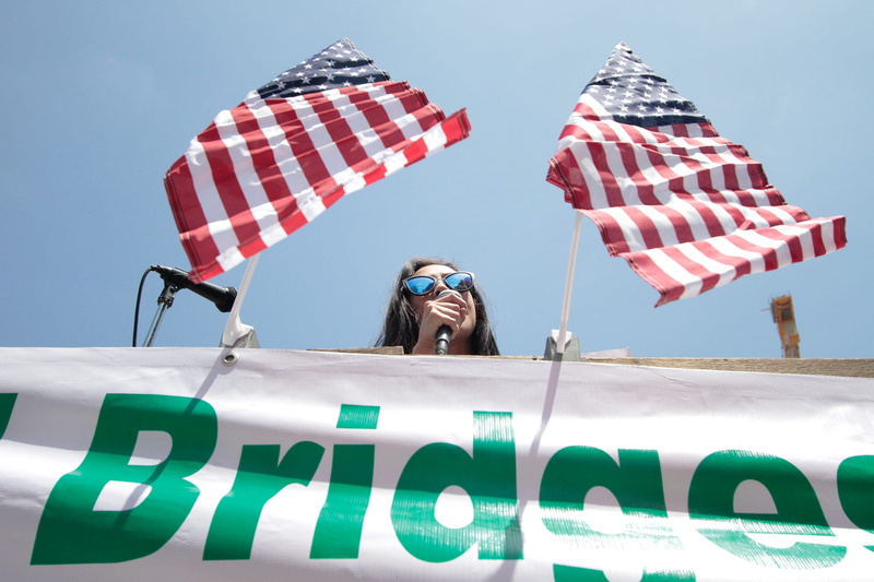 front view, one person, female, nature, resist, freedom, young adult, adult, emotion, text, women, 2K, flag, real people, outdoors, leisure activity, protest