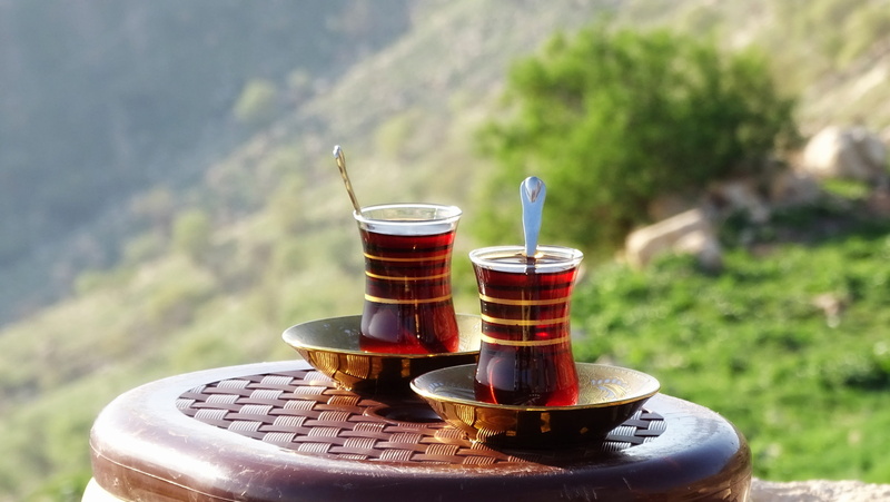 tea, glass, kurdistan, cup, focus on foreground, two, hot drink, mountain, no people, turkish, crockery, nature, container, refreshment, ride, landscape