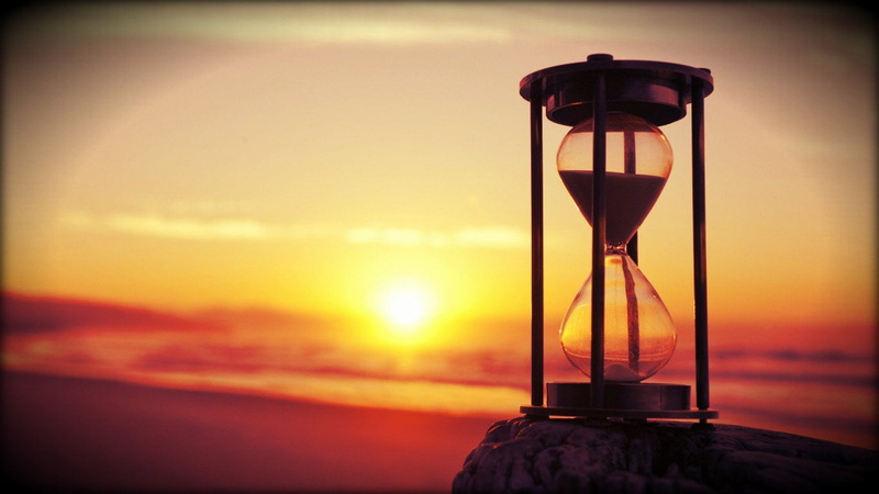 sky, no people, transparent, land, 720P, focus on foreground, sea, sunset, cloud - sky, glass - material, orange color, sand, clock, close-up, outdoors