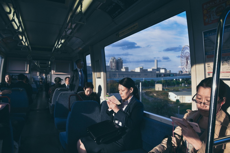 cushion, video gaming, crowd, architecture, metro, window, lifestyles, men, passenger car, person, mode of transportation, overground, aircraft, headrest