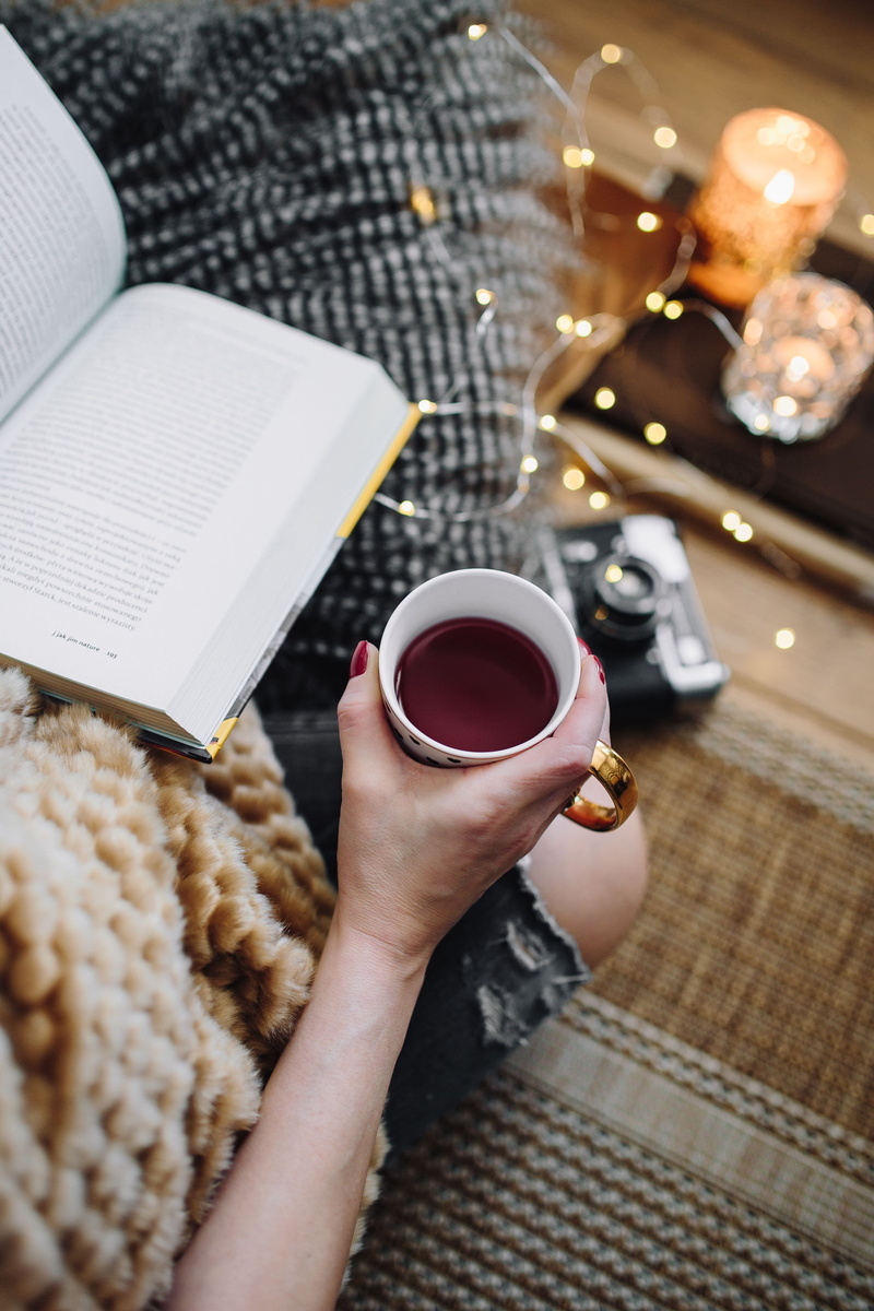 drinking, coffee, reading book, one Person, tea, cozy, home, food and drink, cup, lifestyles, hot drink, holding, comfortable, coffee Cup, reading, pillows