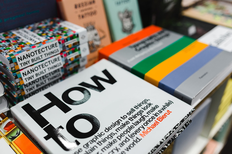 high angle view, table, knowledge, book, bookshop, indoors, selective focus, ink, script, paper, no people, publication, 5K, technology, close-up, bookstore