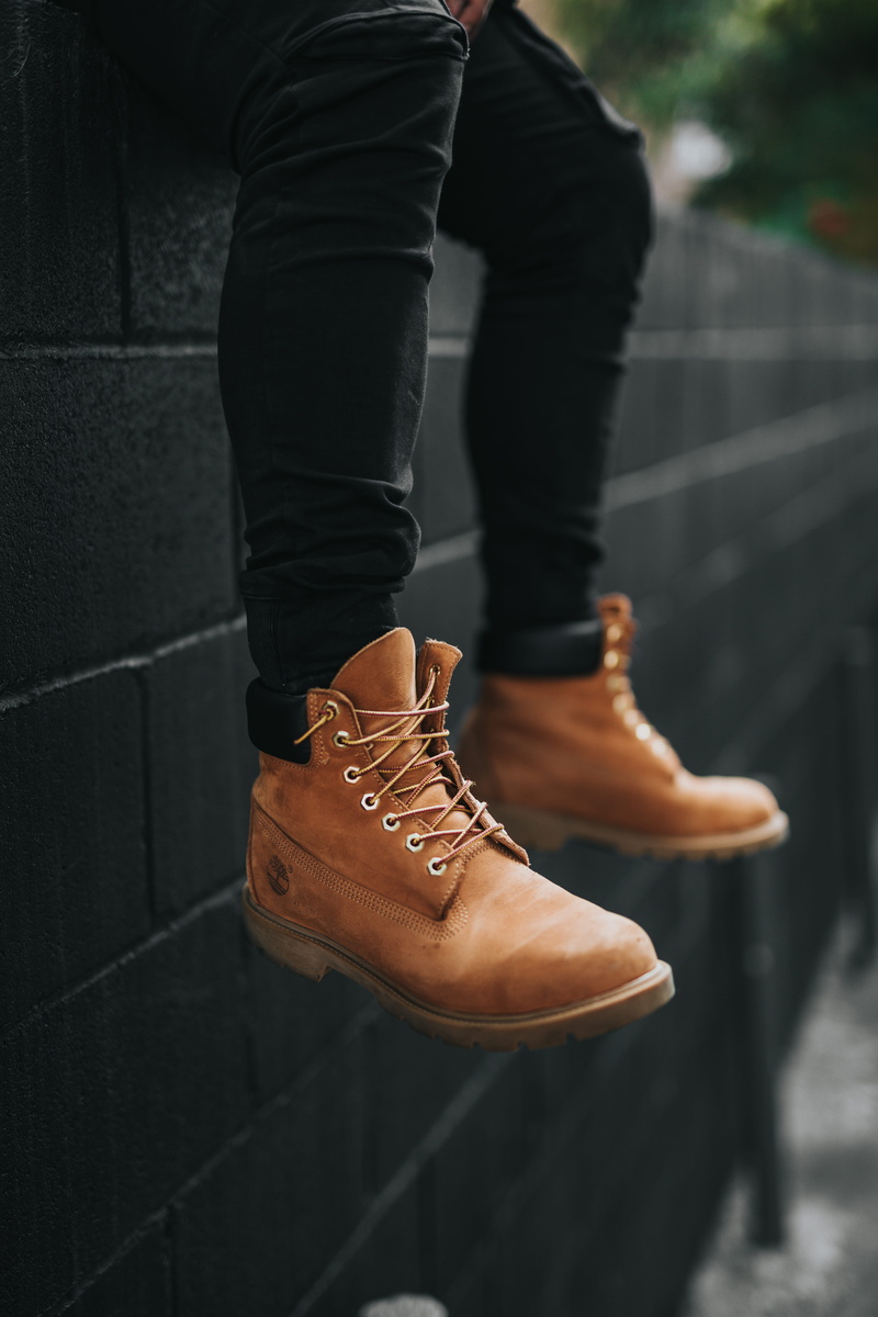 fitted, standing, fashion, real people, casual clothing, black, human limb, men, low section, human body part, shoe, human foot, day, body part, focus on foreground