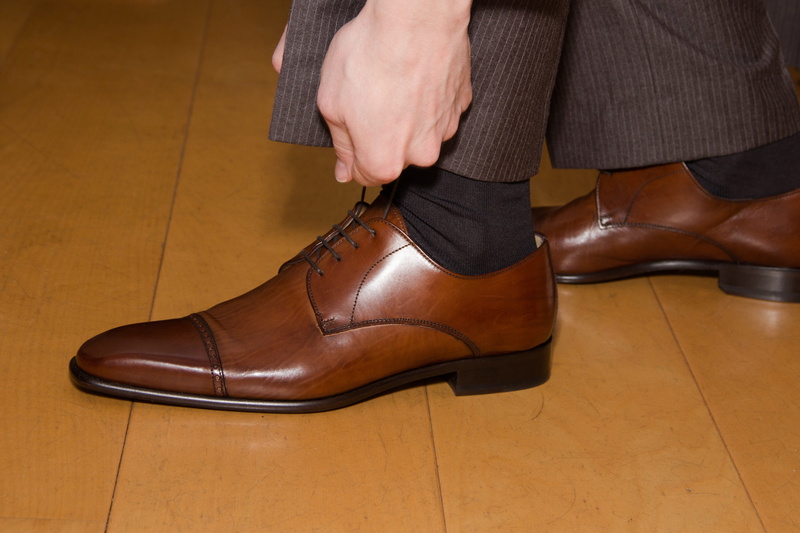 men, laces, shoes, one person, feet, person, close-up, indoors, dress shoe, human limb, human body part, brown, human leg, dress, flooring, bows, adult