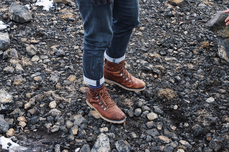 outdoors, men, person, high angle view, body part, jeans, walking, rock, solid, leg, people, blue denim, land, human Foot, real people, pair, brown, denim jeans