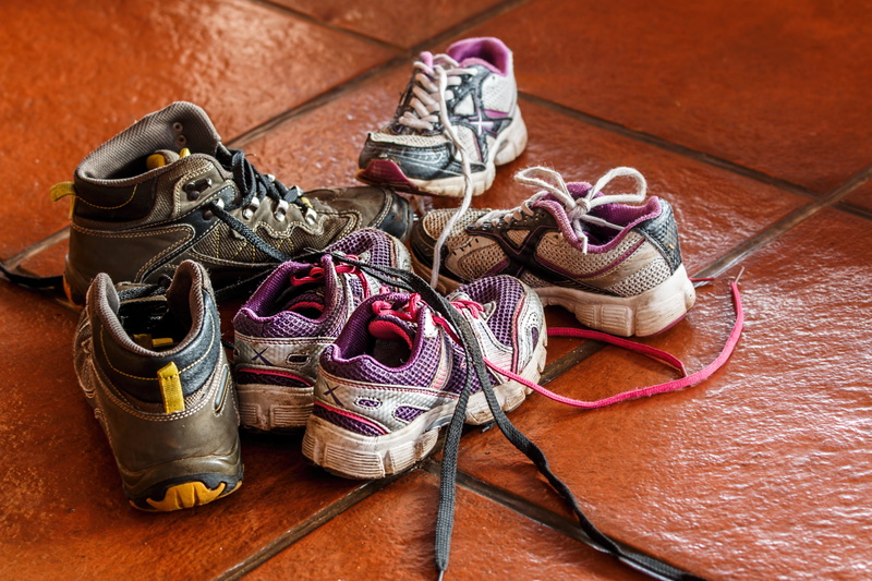 pair, trainers, wood - material, footwear, group of objects, shoe, no people, 5K, close-up, pairs, personal accessory, hardwood floor, high angle view