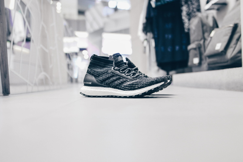 hat, black, close-up, indoors, selective focus, absence, architecture, copy space, adida, surface level, store, black color, surface, shoe, adidas, white