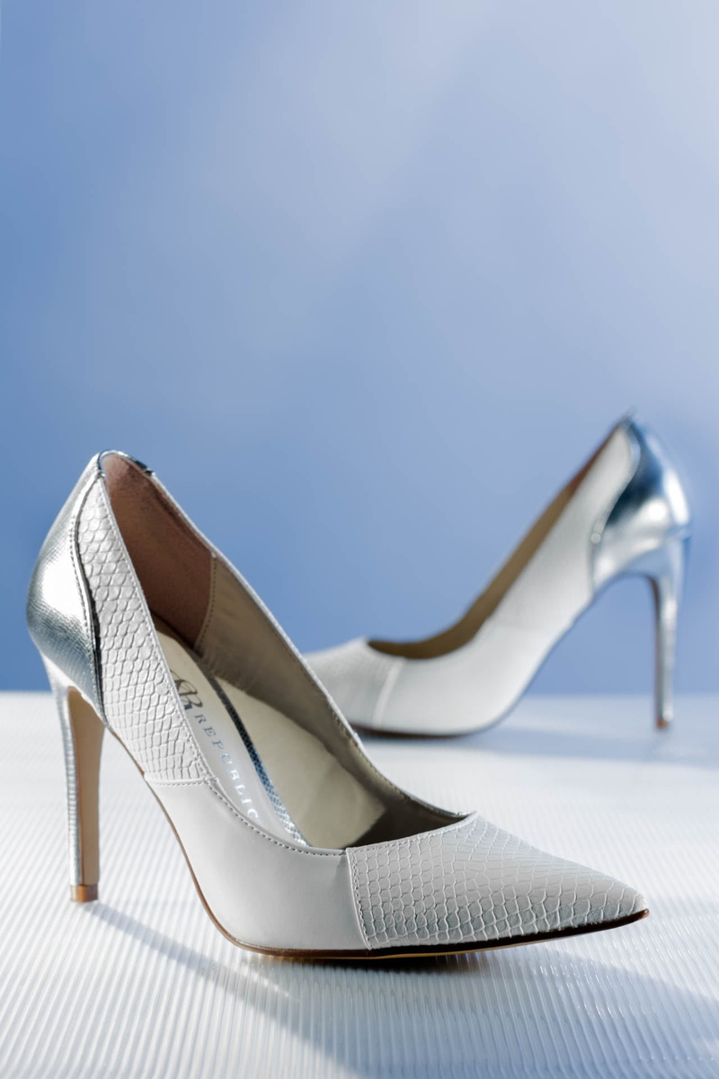 blue background, fashion, female, copy space, glamour, footwear, heels, stiletto, surface, shoe, blue, two objects, style, high heels, dress shoe, indoors