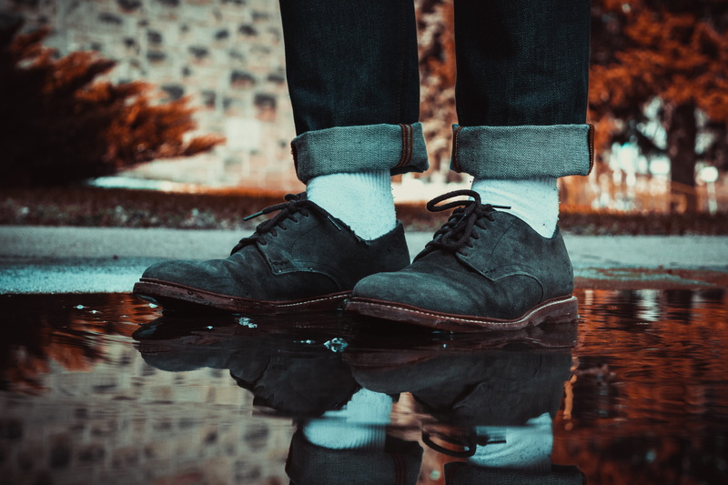 low section, person, boot, brown, standing, shot, day, clothing, mid, shoe, reflection, people, nature, human limb, men, suede, winter, top, one man only