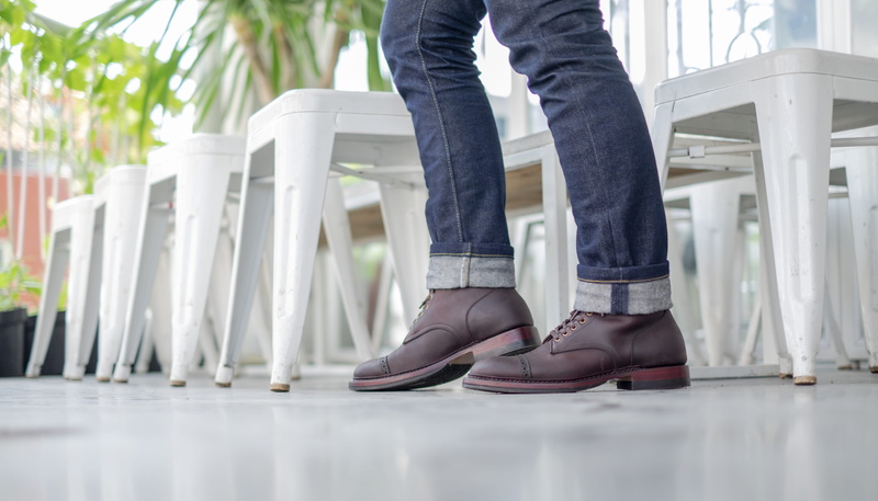 limb, table, person, wood, body part, chair, casual clothing, lifestyles, home decor, low section, human leg, denim, empty, boots, clothing, blue, jeans