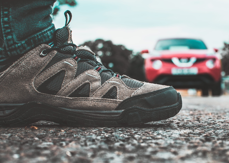 focus on foreground, walk, gray, personal accessory, person, close-up, black, rubber shoes, clothing, hiking, sport, car, red, transportation, leather
