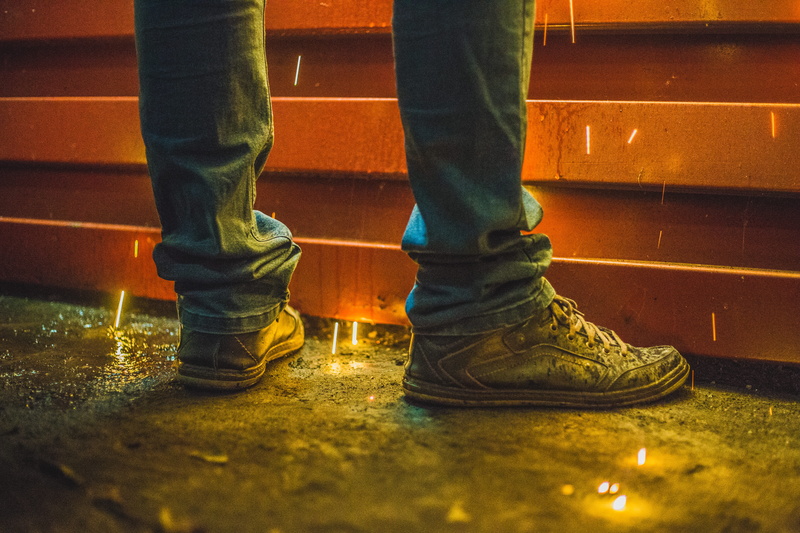 human, human foot, jeans, sunlight, brown, apparel, casual clothing, top, dark, clothing, real people, cowboy boot, men, shoe, man, standing, locksmith
