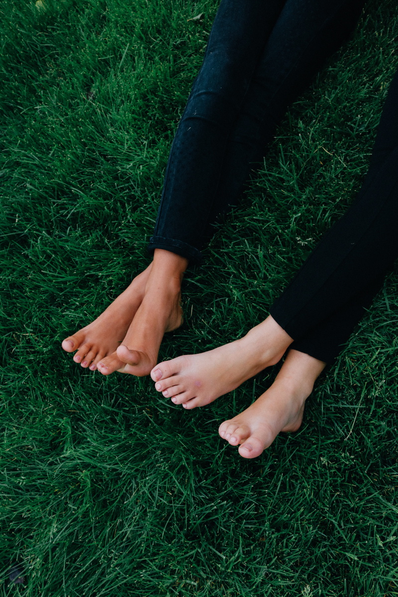 fun, best friends, grass, human body part, finger, human leg, outdoors, woman, low section, leisure, lifestyles, field, legs, person, human hand, jeans