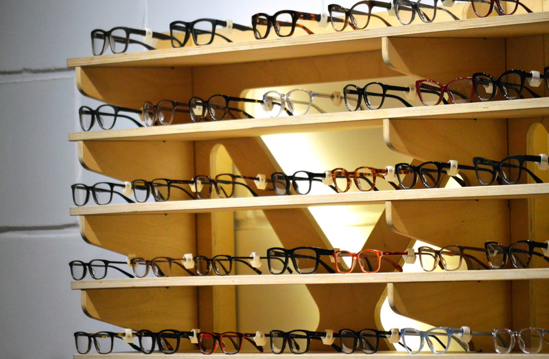 retail, rack, shelf, trendy, fashion, eye, abundance, choice, pattern, architecture, wooden, built structure, in a row, shelves, indoors, large group of objects