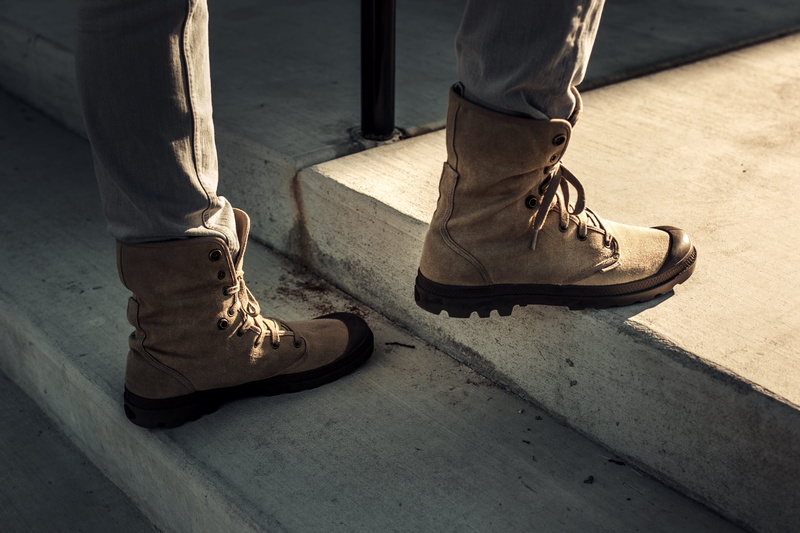 concrete, real people, low section, fashion, boots, style, sunlight, france, shadow, human body part, human limb, body part, one person, palladuim, unrecognizable person