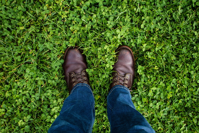 leather, human foot, man, body part, green, grass, blue, casual clothing, personal perspective, day, human leg, standing, outdoors, lifestyles, footwear