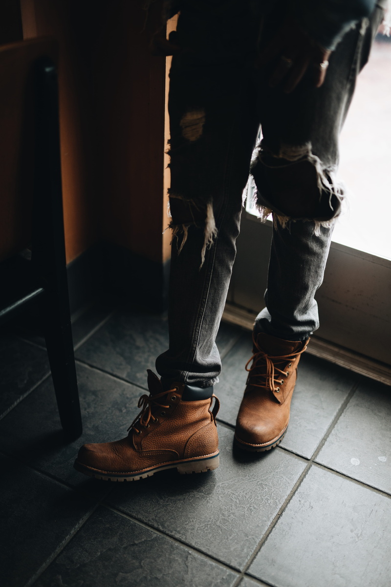 focus on foreground, jeans, denim, body part, flooring, timberland, leather, low section, brown, panel, shoe, standing, men, wearing, 5K, pair, work, boot