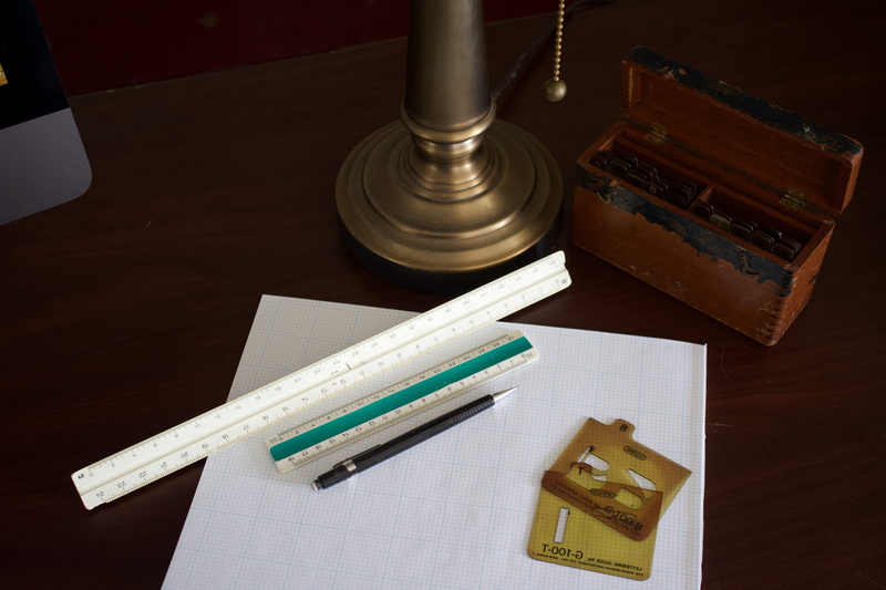high angle view, pencil, ink well, cookie, white, closeup, group of objects, table, close-up, design, handlettering, no people, text, lamp, stencil, desk